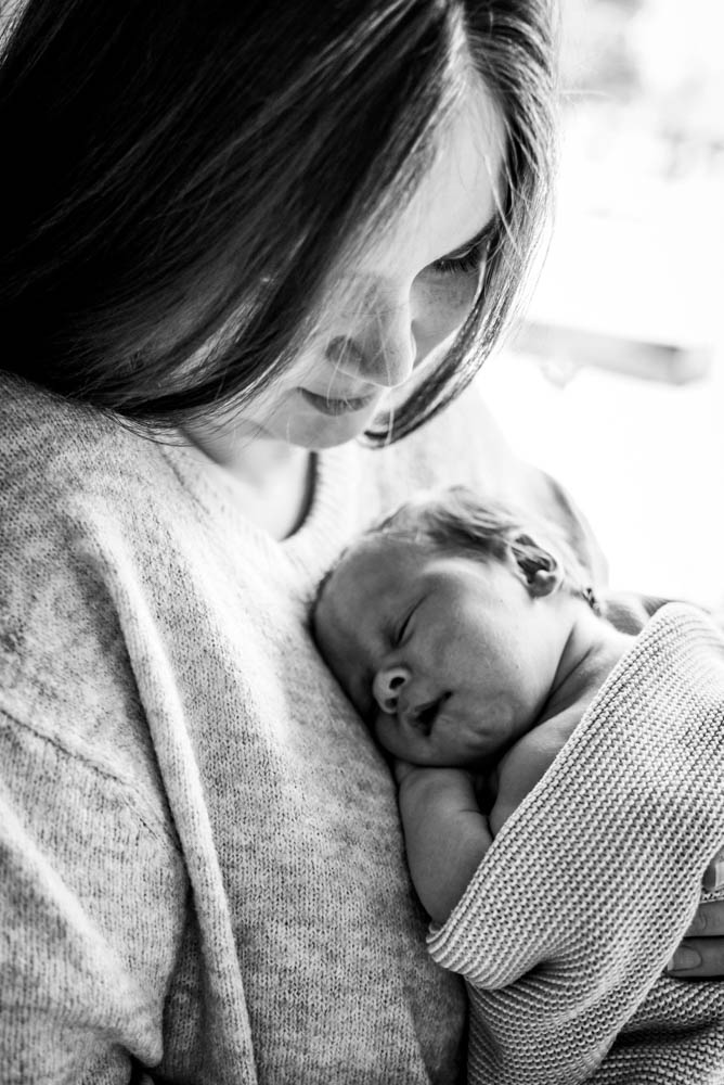 Neugeborenenfotografie mit Mama und Papa